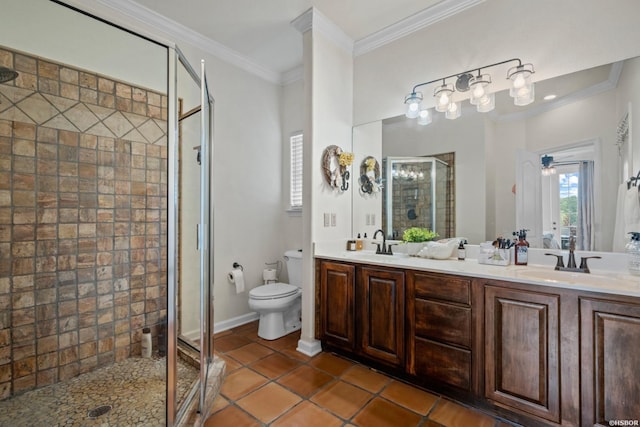 bathroom with a sink, toilet, and crown molding