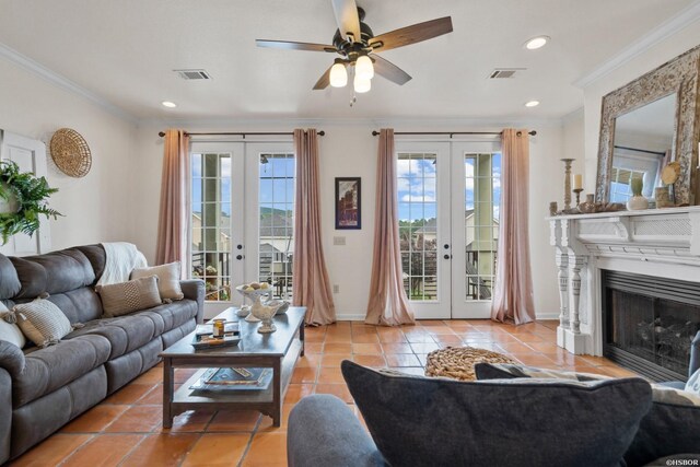 living area with ornamental molding, french doors, and visible vents