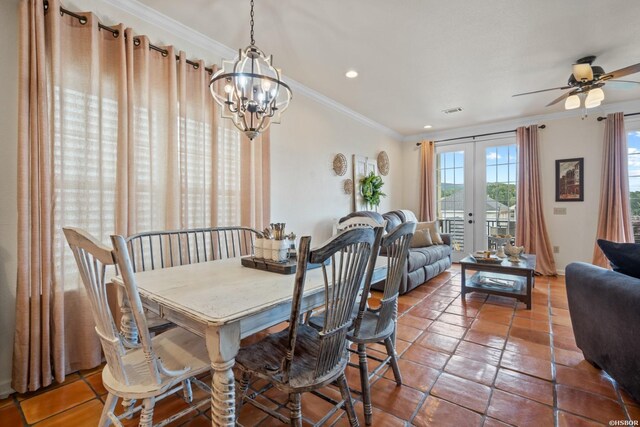 tiled dining area with recessed lighting, ceiling fan with notable chandelier, visible vents, ornamental molding, and french doors