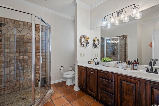 full bathroom with toilet, crown molding, and a sink