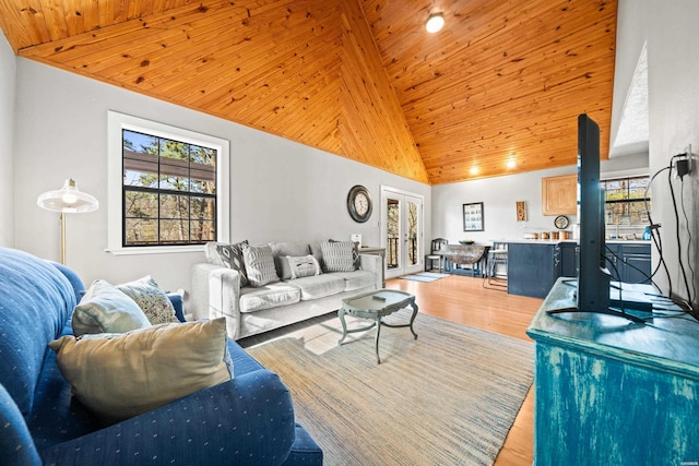 living room featuring wooden ceiling, high vaulted ceiling, and wood finished floors