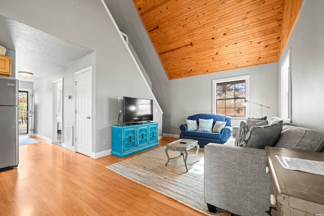 living room with wood ceiling, high vaulted ceiling, baseboards, and light wood-style floors