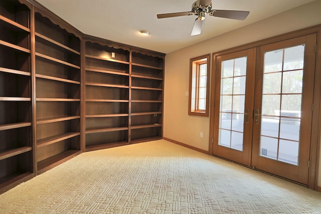 81 End Of Trail Rd, Mount Ida, AR 71957 - unfurnished room with healthy amount of natural light, baseboards, french doors, and carpet