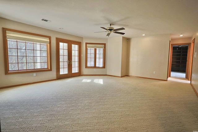 81 End Of Trail Rd, Mount Ida, AR 71957 - empty room featuring a ceiling fan, baseboards, light colored carpet, recessed lighting, and french doors