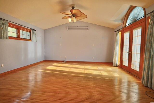 81 End Of Trail Rd, Mount Ida, AR 71957 - unfurnished room with hardwood / wood-style flooring, lofted ceiling, ceiling fan, and baseboards