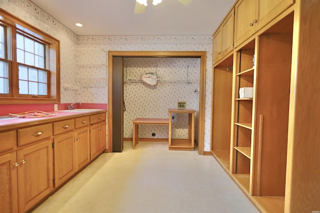 81 End Of Trail Rd, Mount Ida, AR 71957 - hallway featuring wallpapered walls, concrete floors, and a sink
