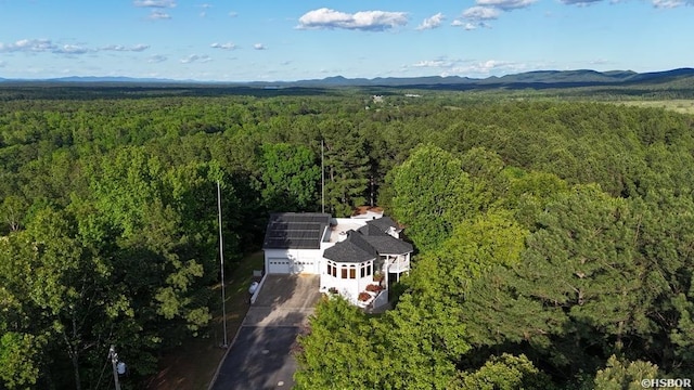 81 End Of Trail Rd, Mount Ida, AR 71957 - aerial view of property and surrounding area featuring a heavily wooded area and a mountainous background