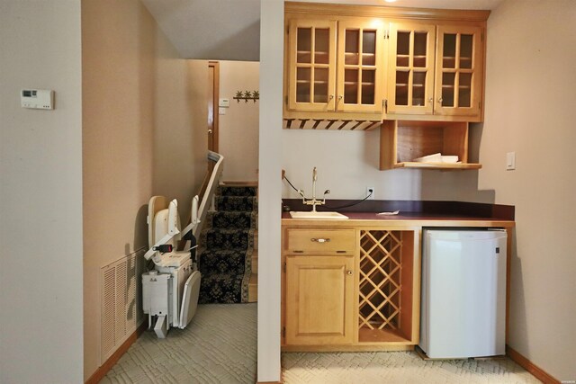 81 End Of Trail Rd, Mount Ida, AR 71957 - bar area featuring a sink, refrigerator, and baseboards