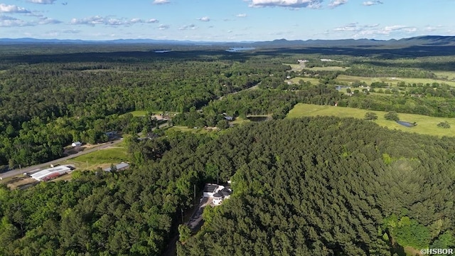 81 End Of Trail Rd, Mount Ida, AR 71957 - aerial overview of property's location with a heavily wooded area and a mountainous background