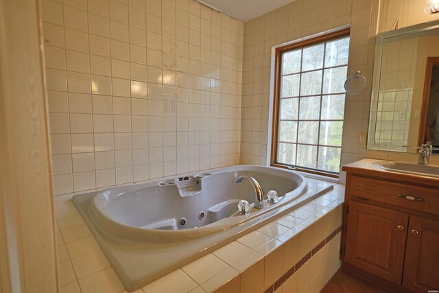 81 End Of Trail Rd, Mount Ida, AR 71957 - full bathroom with tile walls, a whirlpool tub, and vanity