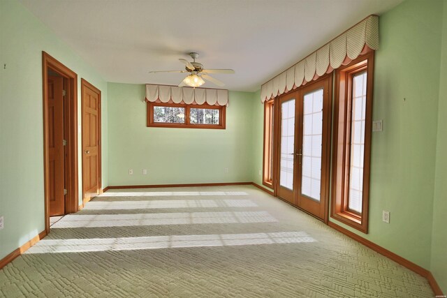 81 End Of Trail Rd, Mount Ida, AR 71957 - unfurnished room with a ceiling fan, baseboards, and light colored carpet