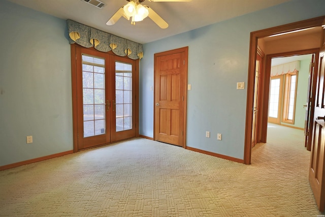 81 End Of Trail Rd, Mount Ida, AR 71957 - carpeted empty room featuring french doors, ceiling fan, and baseboards