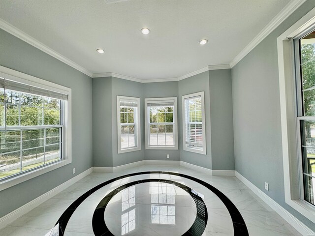 empty room with a wealth of natural light, baseboards, and recessed lighting