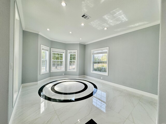 empty room with marble finish floor, visible vents, baseboards, and recessed lighting