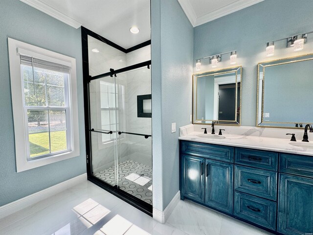 bathroom featuring a sink, baseboards, a shower stall, double vanity, and crown molding