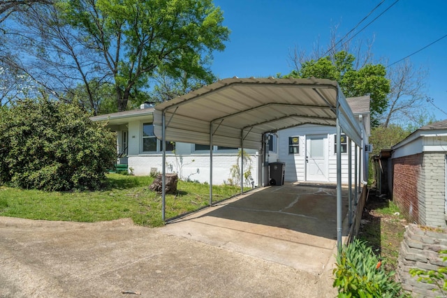 102 Burroughs St, Hot Springs, AR 71913 - view of parking / parking lot featuring driveway and a detached carport