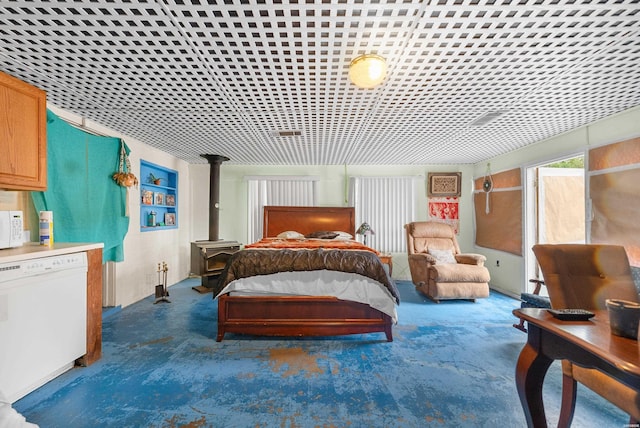 1638 Thornton Fry, Hot Springs, AR 71913 - bedroom with a wood stove and concrete floors