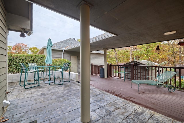 wooden deck with outdoor dining area