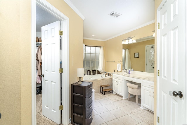 full bathroom featuring tile patterned flooring, vanity, visible vents, a bath, and crown molding