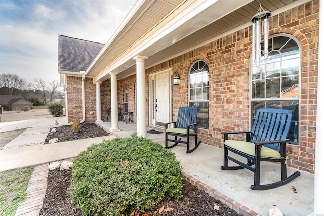 view of patio featuring a porch