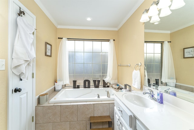 full bath featuring a bath, ornamental molding, and vanity