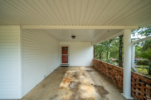 view of patio featuring a carport