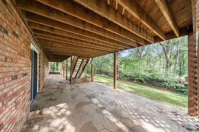 view of patio / terrace featuring stairs