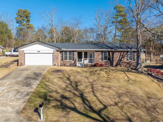 ranch-style house with driveway, brick siding, an attached garage, covered porch, and a front yard