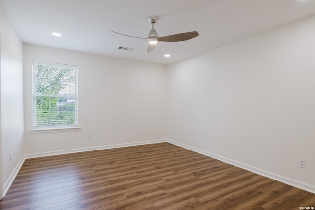 710 Fair Ln, Alexander, AR 72002 - empty room featuring ceiling fan, visible vents, baseboards, and dark wood-style flooring