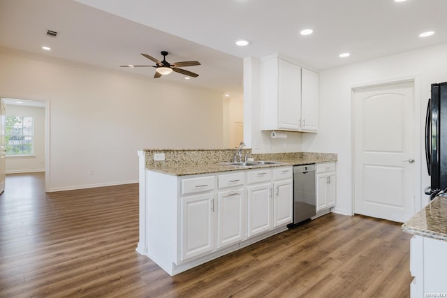 710 Fair Ln, Alexander, AR 72002 - kitchen with wood finished floors, visible vents, stainless steel dishwasher, a sink, and white cabinetry
