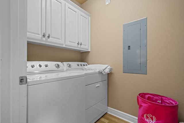 1380 Airport Rd Unit C2, Hot Springs, AR 71913 - laundry area featuring electric panel, separate washer and dryer, cabinet space, light wood-style floors, and baseboards