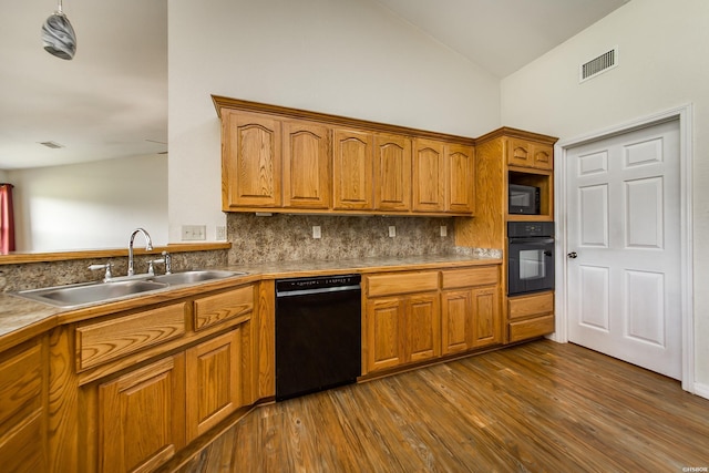 261 Pin Oak Dr, Bismarck, AR 71929 - kitchen with black appliances, tasteful backsplash, brown cabinets, high vaulted ceiling, and dark wood-type flooring