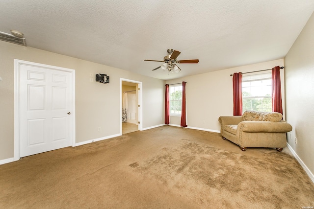 261 Pin Oak Dr, Bismarck, AR 71929 - sitting room with a ceiling fan, carpet, and a textured ceiling