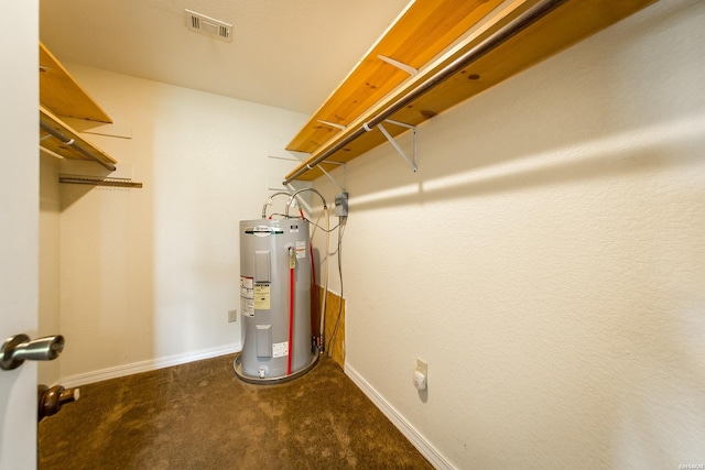 261 Pin Oak Dr, Bismarck, AR 71929 - spacious closet featuring water heater and carpet flooring