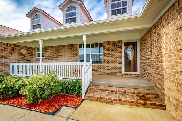 261 Pin Oak Dr, Bismarck, AR 71929 - doorway to property featuring covered porch and brick siding