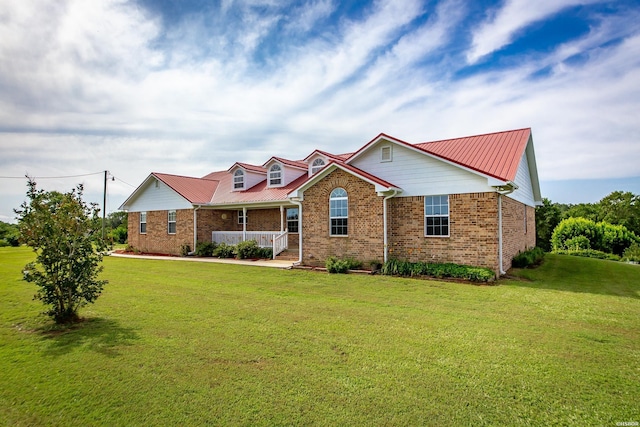 261 Pin Oak Dr, Bismarck, AR 71929 - view of front of house featuring brick siding, a front yard, and a porch