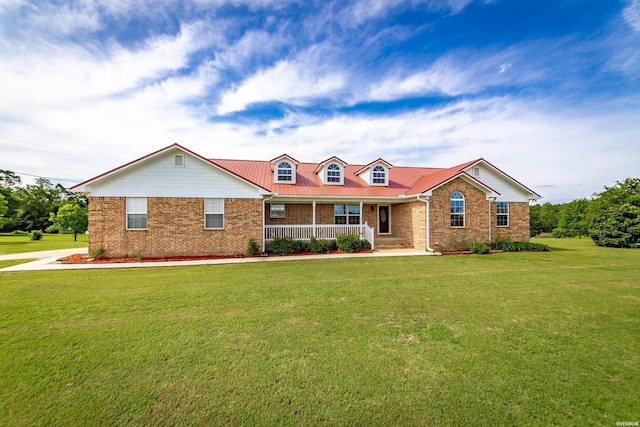 261 Pin Oak Dr, Bismarck, AR 71929 - view of front of property featuring brick siding, covered porch, a front lawn, and a metal roof