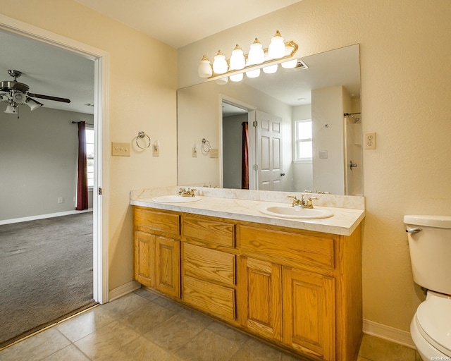 261 Pin Oak Dr, Bismarck, AR 71929 - bathroom featuring double vanity and a ceiling fan