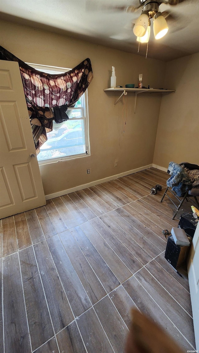 417 Mississippi St Unit B, Hot Springs, AR 71901 - empty room featuring wood finished floors, baseboards, and ceiling fan