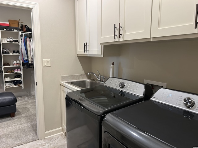 135 Callaway Cir, Hot Springs, AR 71913 - laundry area featuring washer and clothes dryer, cabinet space, and light colored carpet