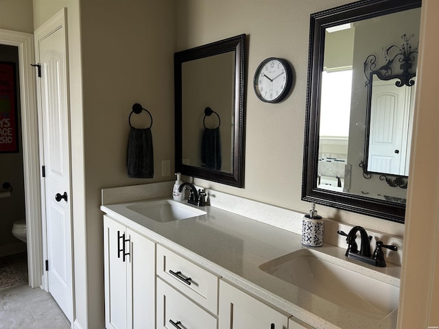 135 Callaway Cir, Hot Springs, AR 71913 - full bathroom featuring toilet and double vanity