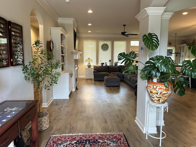 135 Callaway Cir, Hot Springs, AR 71913 - living room featuring ceiling fan, crown molding, wood finished floors, recessed lighting, and arched walkways