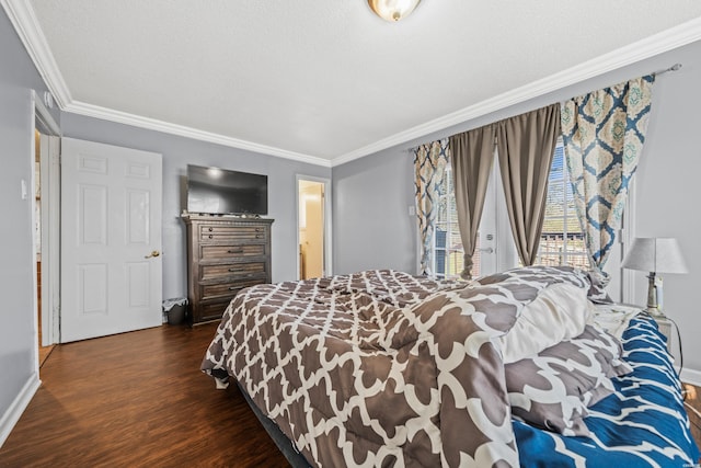 bedroom with a textured ceiling, ornamental molding, and dark wood-style flooring