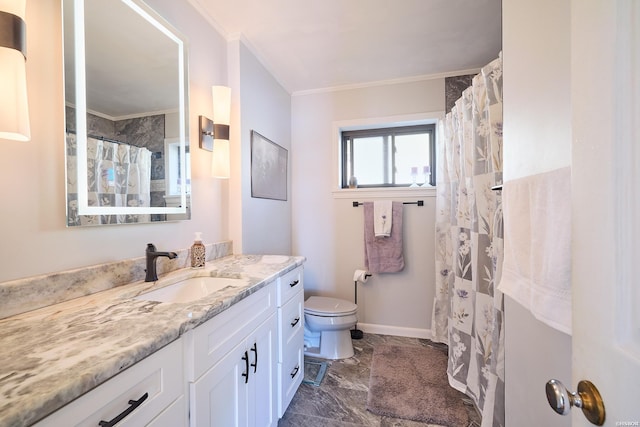 bathroom with toilet, ornamental molding, vanity, and baseboards