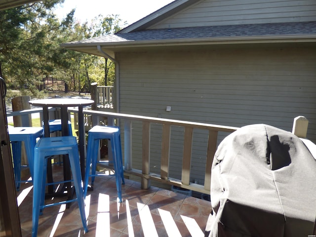 wooden deck featuring area for grilling