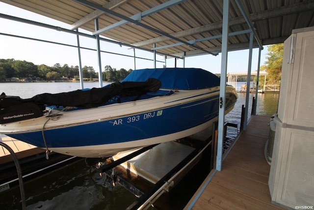 dock area featuring a water view and boat lift