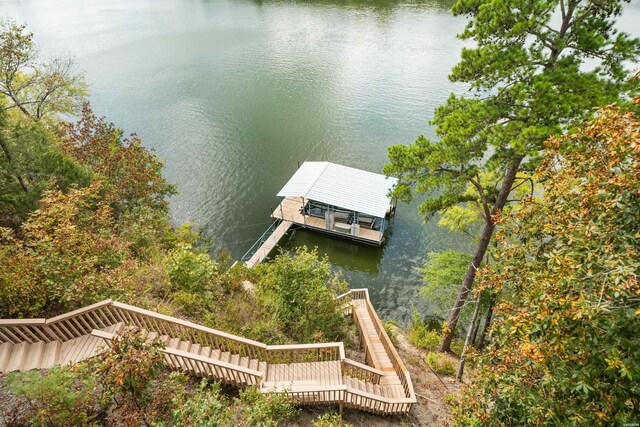 exterior space with a water view