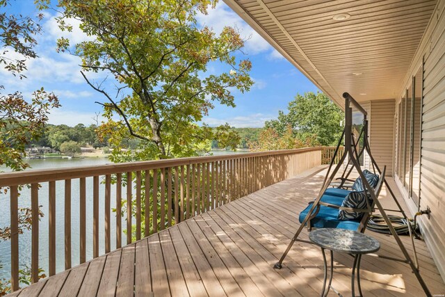 deck featuring a water view