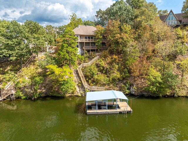 view of dock with a water view and boat lift