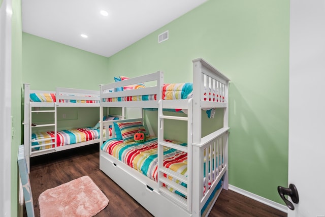 bedroom featuring recessed lighting, visible vents, dark wood finished floors, and baseboards